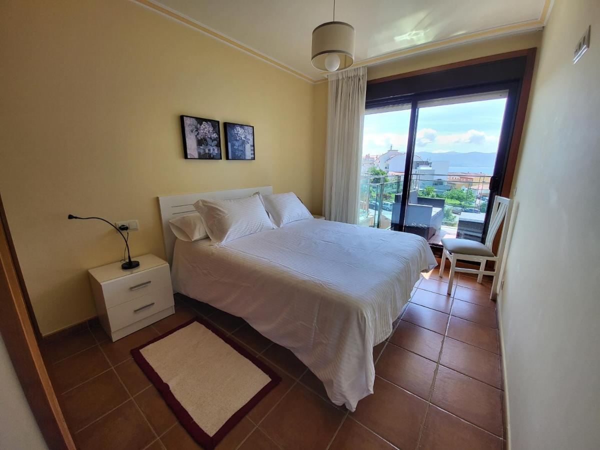 Apartamento Antopa Con Entrada Directa A La Playa - Karkava Travel Sanxenxo Luaran gambar